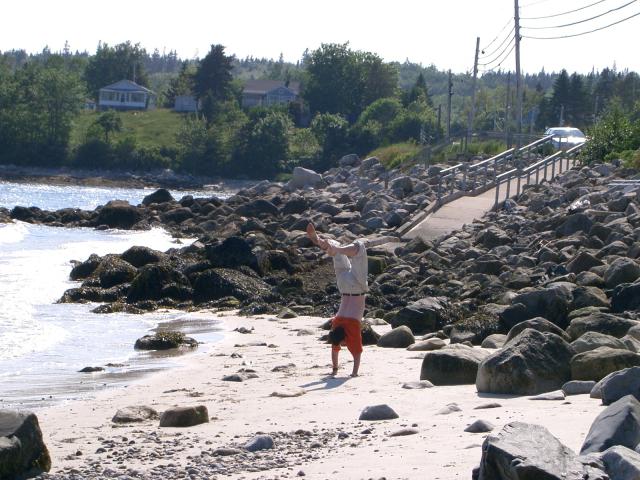Handstand on the sand.