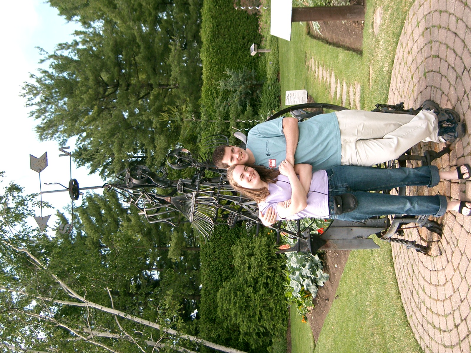 Newly-weds with their new kitchen implements.